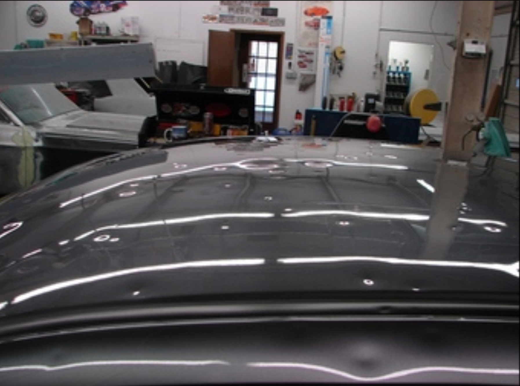 Hail damage dents before repair